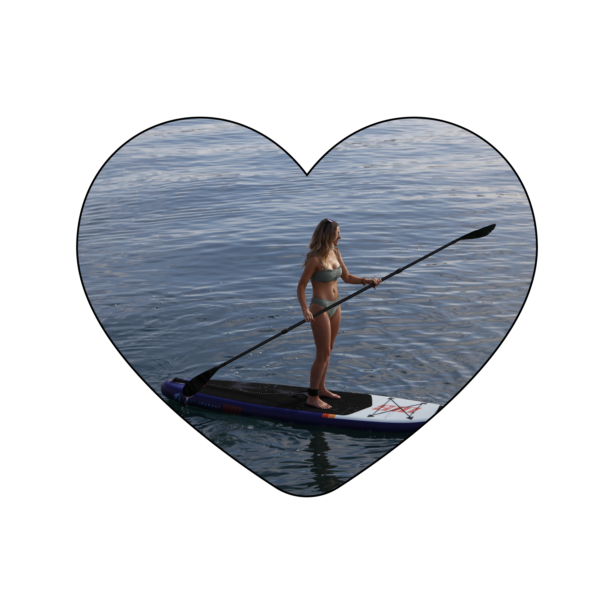 Heart shaped image showcasing the STAGE 2SIDE Paddle held by a girl on an inflatable Stand-up Paddleboard. The heart represents the STAGE 2SIDE Love Your 2SIDE Paddle Guarantee where STAGE offers free returns on the 2SIDE even if you use the paddle.