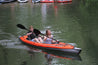 Two children kayaking with the STAGE 2-Piece Kayak Paddle and an Advanced Elements Inflatable Kayak