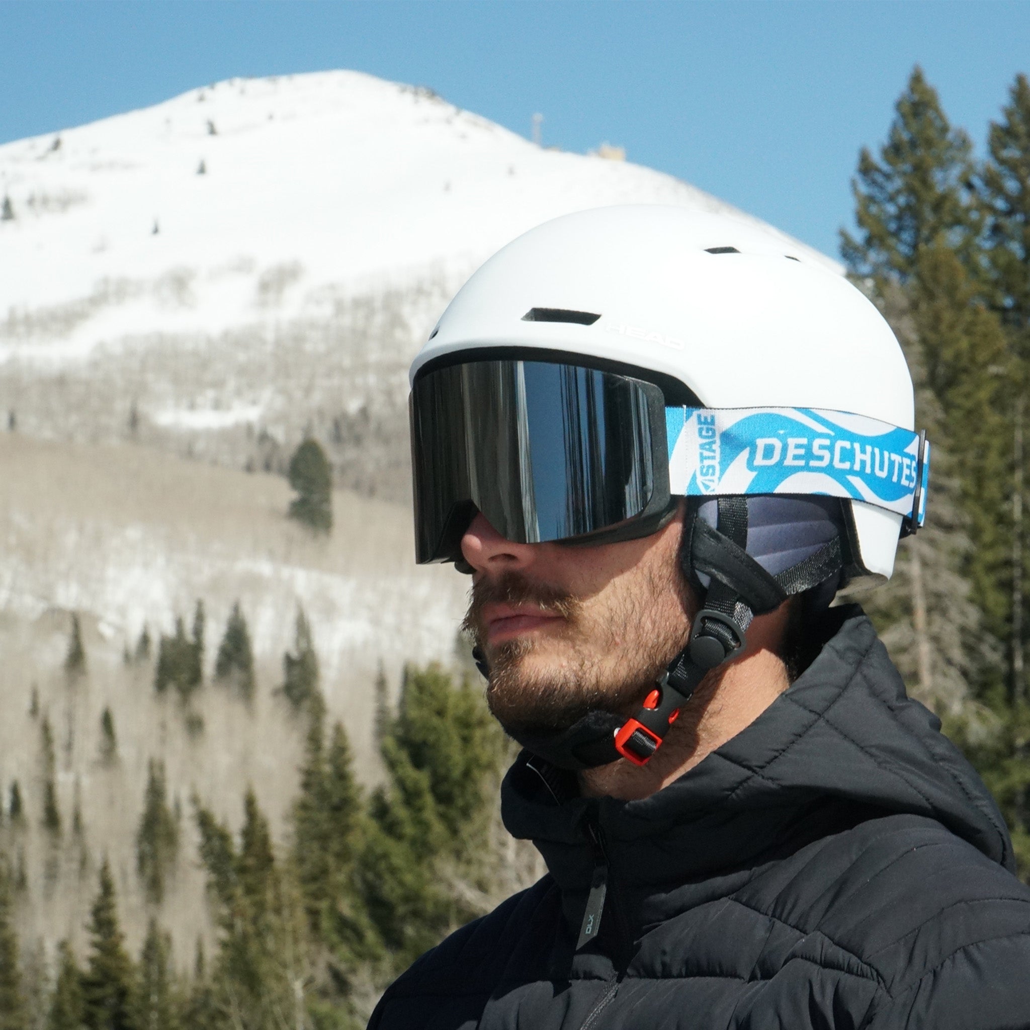 The STAGE Propnetic, Magnetic Ski Goggle featuring Mirror Chrome Smoke Revo Lens and Deschutes custom ski goggle strap. 